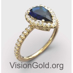 Klassischer Halo-Ring mit blauem Stein in Gelbgold 149KMP