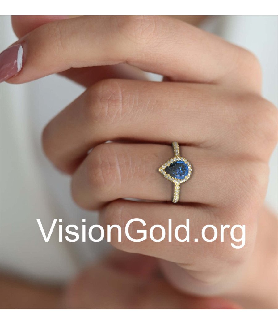 Klassischer Halo-Ring mit blauem Stein in Gelbgold 149KMP