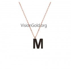 Pendentifs en or avec monogrammes