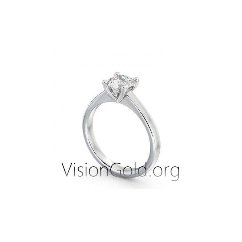 Klassischer Ring aus Weißgold mit einem Stein aus 14 Karat Gold