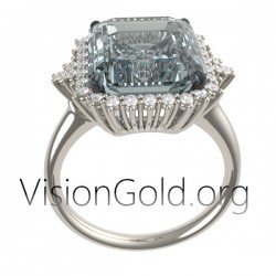 Classic Ring With Aquamarine Emerald Cut And Diamonds On Offer