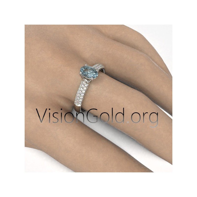 Anillo de propuesta de matrimonio en oro blanco con aguamarina y diamantes brillantes 1050