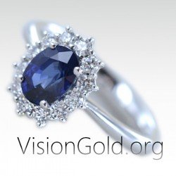 Δαχτυλίδι ροζέτα με οβάλ ζαφείρι και μπριγιάν διαμάντια|