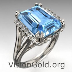 Aquamarin Ring im Smaragdschliff mit Diamanten im